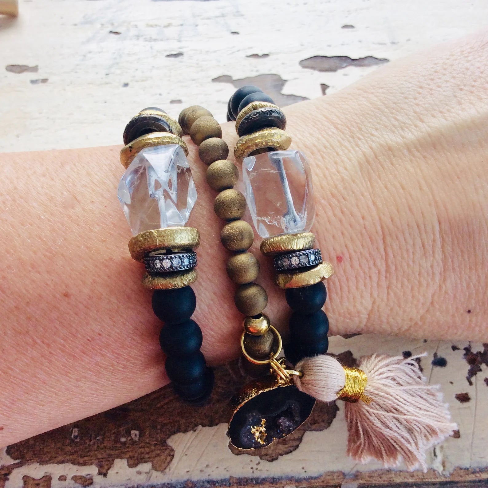 Crystal Quartz Onyx Bracelet worn on wrist, showcasing clear quartz and matte black onyx beads, handmade in Canada.